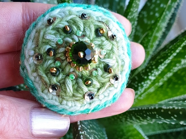 fiber art crocheted brooch
